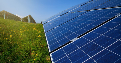 Thermal solar panels on a hillside, utilizing sunlight to produce renewable energy.