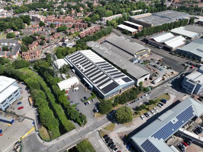 Solar panels crowning a textiles producing company building