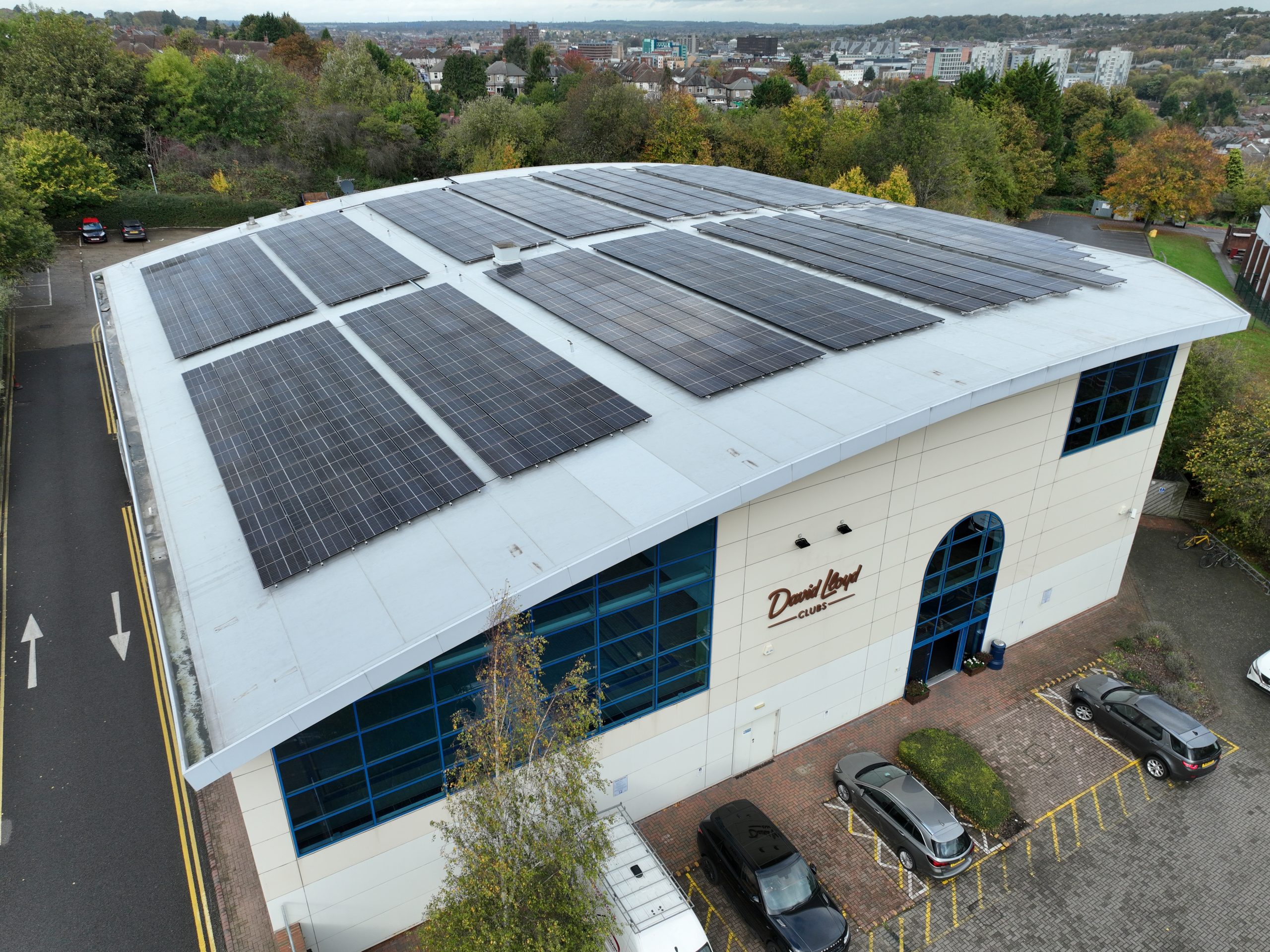 solar panels on a gymnasium curved roof